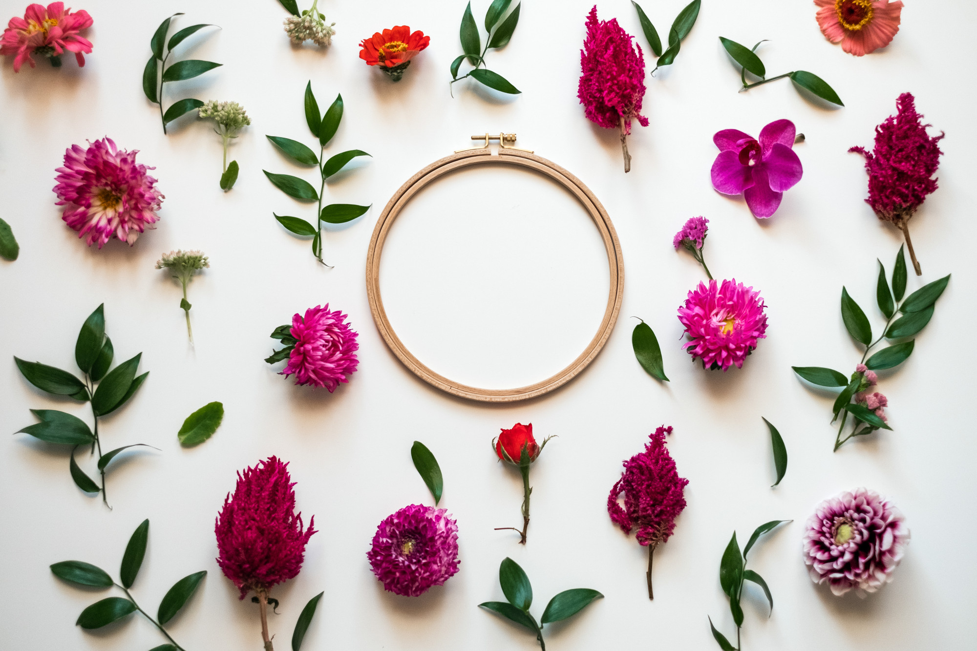 Close-up embroidered floral hoop finished